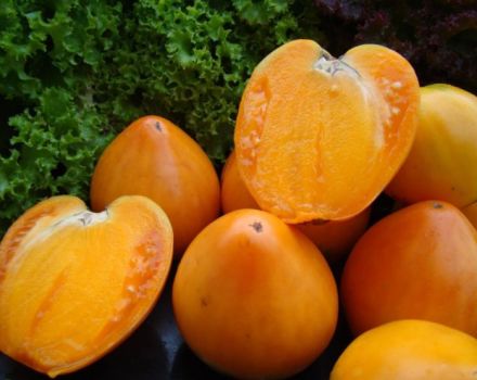 Eigenschaften und Beschreibung der Tomatensorte Golden Heart, deren Ertrag