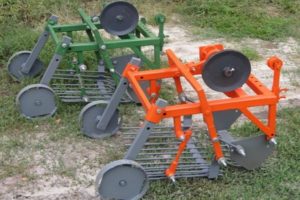 Hvordan lage en potetgraver til en walk-bak traktor med egne hender?